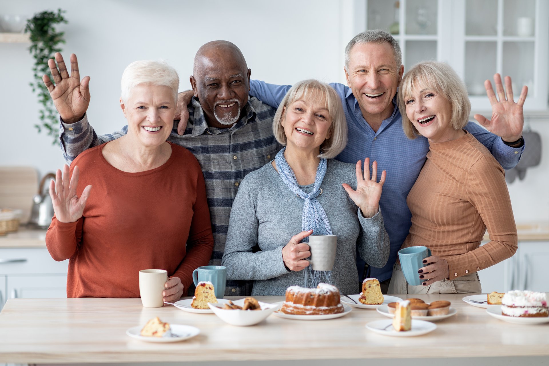 Joyful connection between caregiver and senior at Legacy Blooms